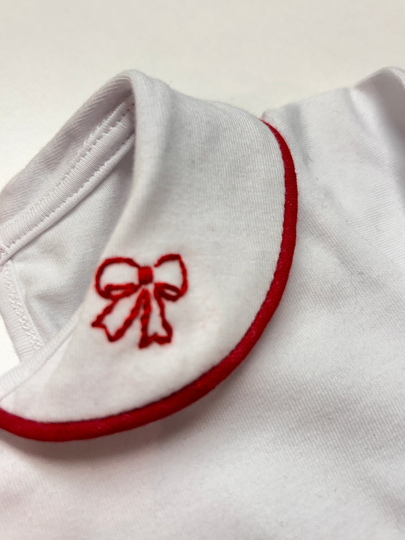 LONDON Body fiocco profilo rosso
